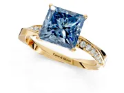 Side Accent Engagement Ring Setting for Fancy Blue Princess Cut Center with Accent Shoulders and Prong Head in Yellow Gold