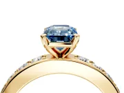 Solitaire Engagement Ring Setting for Fancy Blue Emerald Cut Center with Channel-Set Accents and Prong Head in Yellow Gold