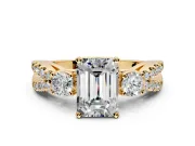 3 Stone Engagement Ring Setting for Emerald Cut Center with Pave Split Shank and Prong Head in Yellow Gold