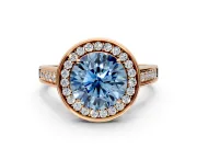 Halo Engagement Ring Setting for Fancy Blue Round Cut Center with Outer Bezel Rim, Pave Band and Prong Head in Rose Gold