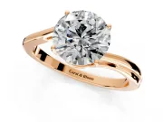 Solitaire Engagement Ring Setting for Round Cut Center with Plain Bypass Twist Band and Prong Head in Rose Gold