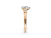 3 Stone Engagement Ring Setting for Pear-Shaped Center with Wide Plain Band and Prong Head in Rose Gold