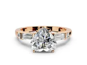 Bar-Set Engagement Ring Setting for Heart-Shaped Center with Tapered Baguette Accents and Prong Head in Rose Gold