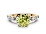 Shared-Prong Engagement Ring Setting for Fancy Yellow Round Cut Center with Graduated Accents and Prong Head in Yellow Gold