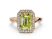 Halo Engagement Ring Setting for Fancy Yellow Emerald Cut Center with Twist Band and Prong Head in Rose Gold