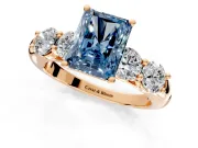 5 Stone Engagement Ring Setting for Fancy Blue Radiant Cut Center with Graduated Accents and Prong Head in Rose Gold