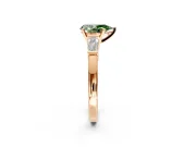 3 Stone Engagement Ring Setting for Fancy Green Pear-Shaped Center with Channel Baguette Accents and Prong Head in Rose Gold