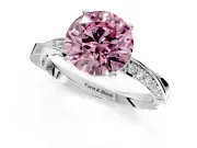 Side Accent Engagement Ring Setting for Fancy Pink Round Cut Center with Accent Shoulders and Prong Head in White Gold