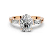 3 Stone Engagement Ring Setting for Oval Center with Tapered Baguettes, Plain Band and Prong Head in Rose Gold