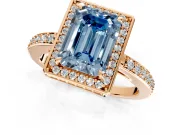 Halo Engagement Ring Setting for Fancy Blue Emerald Cut Center with Metal-Rimmed Halo, Pave Band and Prong Head in Rose Gold