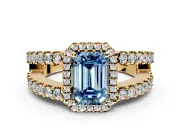 Halo Engagement Ring Setting for Fancy Blue Emerald Cut Center with Wide-Open Pave Split Shank and Prong Head in Yellow Gold