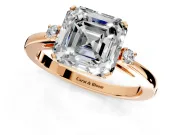 3 Stone Engagement Ring Setting for Asscher Cut Center with Low-Set Round Cut Accents and Prong Head in Rose Gold