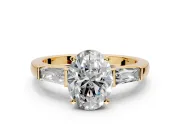 3 Stone Engagement Ring Setting for Oval Center with Tapered Baguettes, Plain Band and Prong Head in Yellow Gold