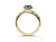 Solitaire Engagement Ring Setting for Fancy Blue Round Cut Center with Trailing Leaf Accent Band and Prong Head in Yellow Gold
