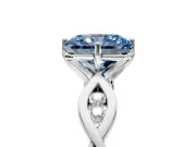 Solitaire Engagement Ring Setting for Fancy Blue Radiant Cut Center with Accented Twist Band and Leaf Prong Head in Platinum