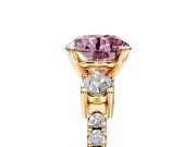 3 Stone Engagement Ring Setting for Fancy Pink Round Cut Center with Round Cut Side Accents and Prong Head in Yellow Gold
