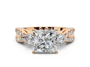 3 Stone Engagement Ring Setting for Princess Cut Center with Pave Split Shank and Prong Head in Rose Gold