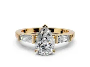 3 Stone Engagement Ring Setting for Pear-Shaped Center with Tapered Baguettes, Plain Band and Prong Head in Yellow Gold