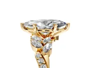 Solitaire Engagement Ring Setting for Marquise Center with Marquise Accent Twist Band and Prong Head in Yellow Gold