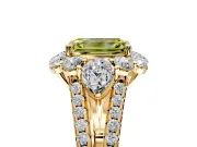 Halo Engagement Ring Setting for Fancy Yellow Emerald Cut Center with Two-Strand Split Shank and Prong Head in Yellow Gold