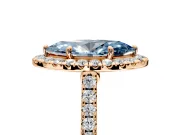 Halo Engagement Ring Setting for Fancy Blue Marquise Center with Narrowing Pave Band and Prong Head in Rose Gold