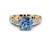 Solitaire Engagement Ring Setting for Fancy Blue Round Cut Center with Graduated Shared Prongs and Prong Head in Yellow Gold