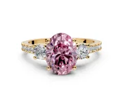 3 Stone Engagement Ring Setting for Fancy Pink Oval Center with Round Cut Side Accents and Prong Head in Yellow Gold