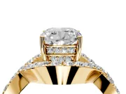 Halo Engagement Ring Setting for Cushion Cut Center with Pave Infinity Twist Band and Prong Head in Yellow Gold