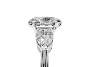 3 Stone Engagement Ring Setting for Oval Center with Large Pear-Shaped Accents and Prong Head in Platinum