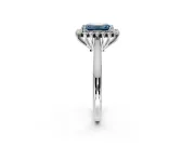 Starburst Halo Engagement Ring Setting for Fancy Blue Emerald Cut Center with Thin Round-Wire Band and Prong Head in Sterling Silver