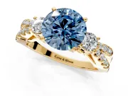 3 Stone Engagement Ring Setting for Fancy Blue Round Cut Center with Pave Split Shank and Prong Head in Yellow Gold