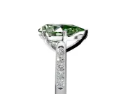 Solitaire Engagement Ring Setting for Fancy Green Pear-Shaped Center with Channel Accents and Prong Head in Platinum