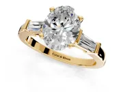 3 Stone Engagement Ring Setting for Oval Center with Channel Baguette Accents and Prong Head in Yellow Gold