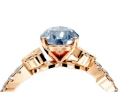 Leaf Motif Engagement Ring Setting for Fancy Blue Pear-Shaped Center with Pave Band and Prong Head in Rose Gold