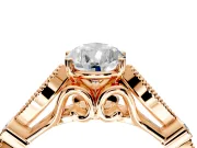 Solitaire Engagement Ring Setting for Pear-Shaped Center with Marquise and Bezel Accents and Prong Head in Rose Gold