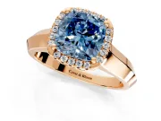 Halo Engagement Ring Setting for Fancy Blue Cushion Cut Center with Knife Ridge Cathedral Band and Prong Head in Rose Gold
