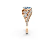 Halo Engagement Ring Setting for Fancy Blue Pear-Shaped Center with Marquise and Pave Bypass Band and Prong Head in Rose Gold