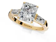 3 Stone Engagement Ring Setting for Radiant Cut Center with Tapered Baguettes, Plain Band and Prong Head in Yellow Gold
