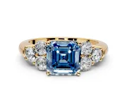 Cluster Engagement Ring Setting for Fancy Blue Asscher Cut Center with Round Cut Accent Frame and Prong Head in Yellow Gold