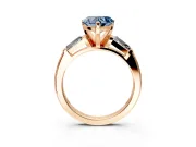 3 Stone Engagement Ring Setting for Fancy Blue Heart-Shaped Center with Tapered Baguettes, Plain Band and Prong Head in Rose Gold