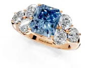 Cluster Engagement Ring Setting for Fancy Blue Radiant Cut Center with Round Cut Accent Frame and Prong Head in Rose Gold