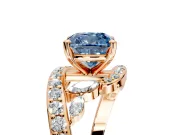 Solitaire Engagement Ring Setting for Fancy Blue Cushion Cut Center with Pave Bypass Twist Band and Prong Head in Rose Gold