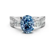3 Stone Engagement Ring Setting for Fancy Blue Oval Center with Pave Twist Band and Prong Head in White Gold