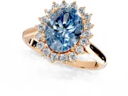 Starburst Halo Engagement Ring Setting for Fancy Blue Oval Center with Thin Round-Wire Band and Prong Head in Rose Gold