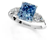3 Stone Engagement Ring Setting for Fancy Blue Radiant Cut Center with Large Pear-Shaped Accents and Prong Head in Sterling Silver