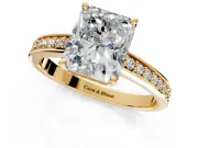 Solitaire Engagement Ring Setting for Radiant Cut Center with Channel-Set Accent Band and Prong Head in Yellow Gold