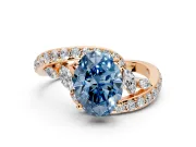 Solitaire Engagement Ring Setting for Fancy Blue Oval Center with Pave Bypass Twist Band and Prong Head in Rose Gold
