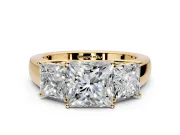 3 Stone Engagement Ring Setting for Princess Cut Center with Raised Basket Heads and Prong Head in Yellow Gold