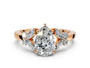 Solitaire Engagement Ring Setting for Pear-Shaped Center with Marquise Flower Shoulders and Prong Head in Rose Gold