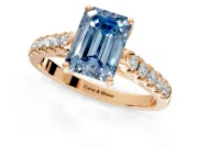 Solitaire Engagement Ring Setting for Fancy Blue Emerald Cut Center with Partway Pave Band and Prong Head in Rose Gold